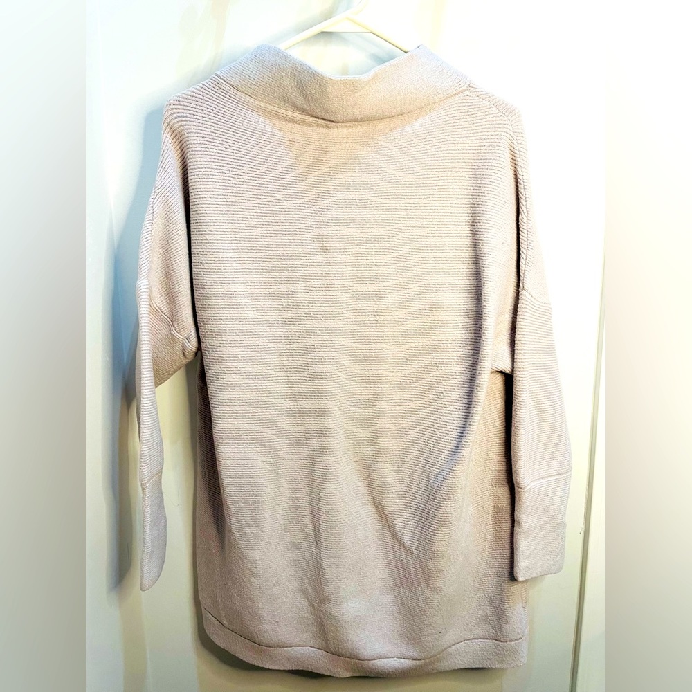 Cozy grey sweater to wear in fall and winter. Goes great with jeans and boots.